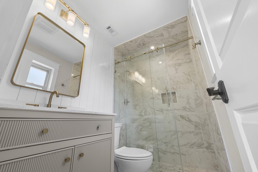 This impeccably renovated home is ready to move in! From the - photo 21