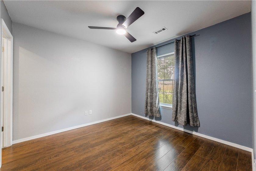 Tucked beneath a mature hardwood canopy in an established - photo 24