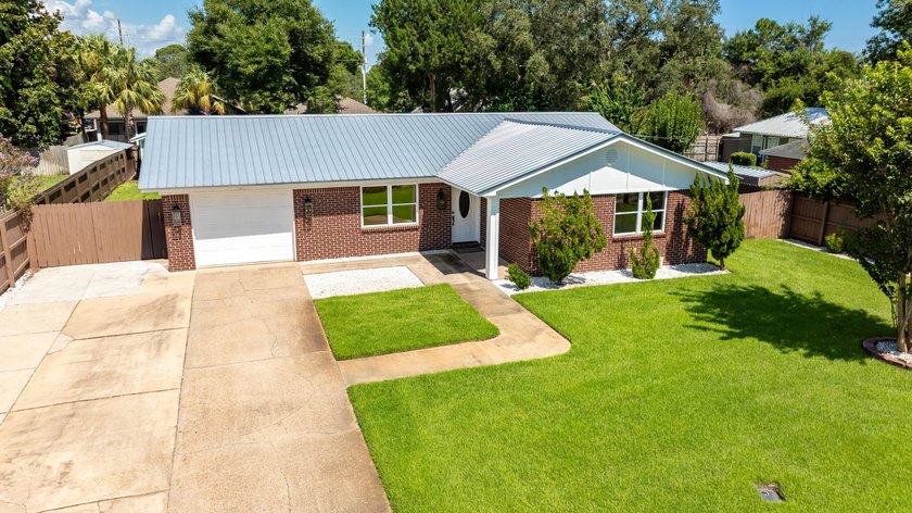 This impeccably renovated home is ready to move in! From the - photo 45