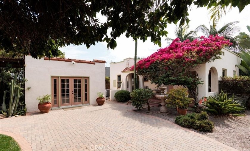 The timeless Spanish colonial revival design of the historic - photo 24
