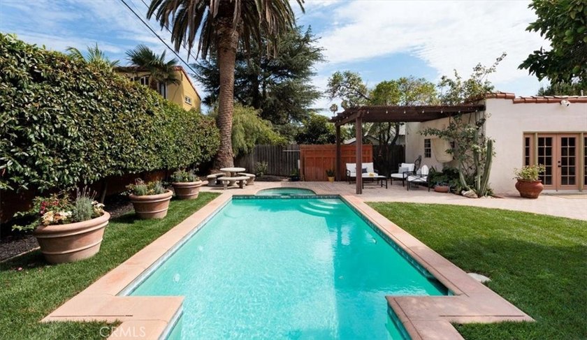 The timeless Spanish colonial revival design of the historic - photo 32