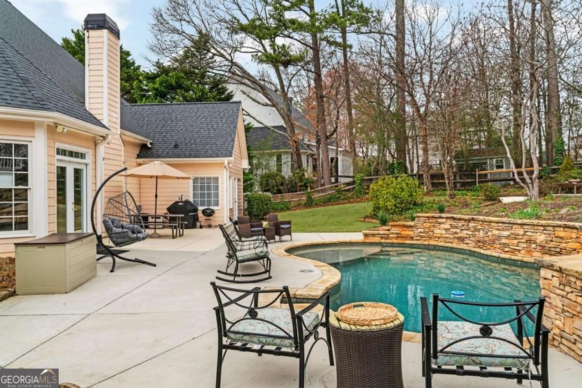 Located in a highly sought after swim tennis community, this - photo 47