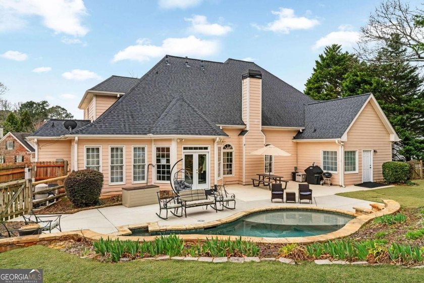 Located in a highly sought after swim tennis community, this - photo 48