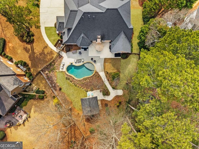 Located in a highly sought after swim tennis community, this - photo 56