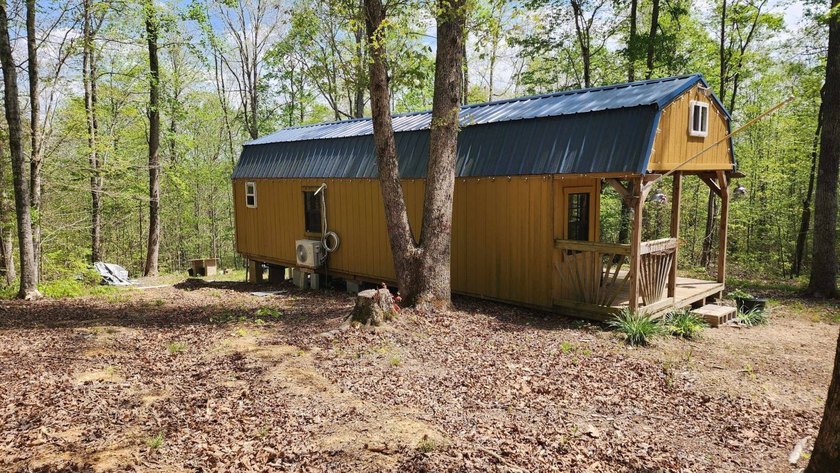 Discover your private escape on 10.94 +/- wooded acres close to - photo 9