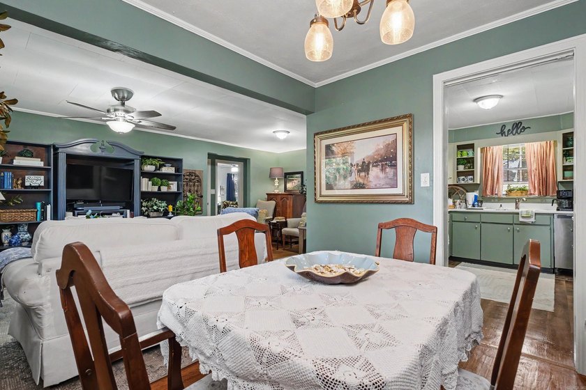 Nestled in the heart of Park Hill, this inviting home offers the - photo 3