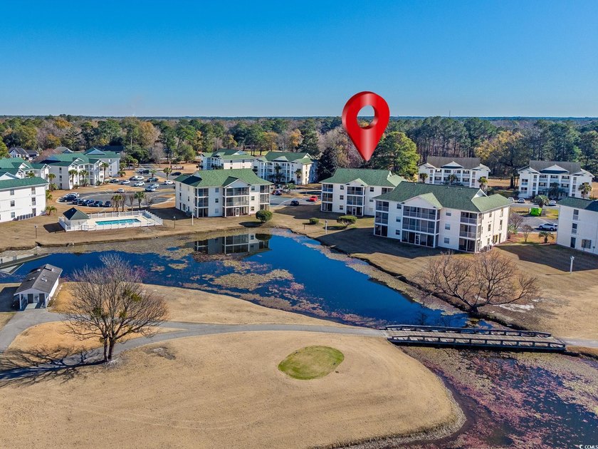 Great golf course and water views from this top floor condo in - photo 3