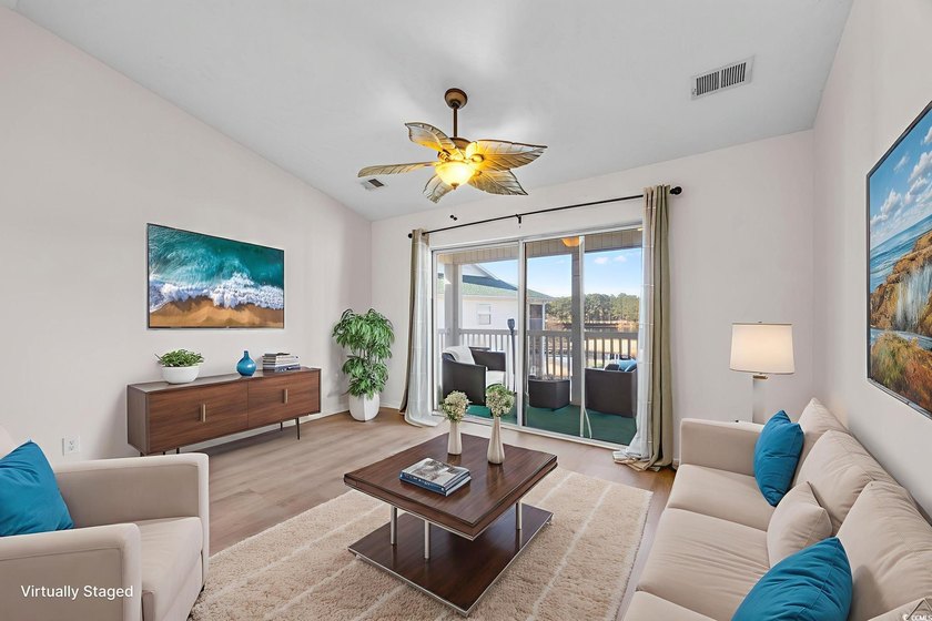 Great golf course and water views from this top floor condo in - photo 4