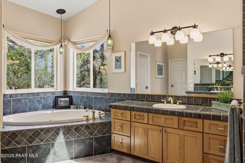 This exceptional property offers privacy and majestic tall pines - photo 33