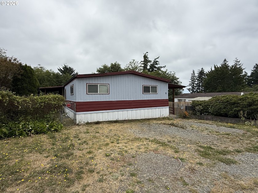 This spacious 1,800+ square foot manufactured home offers an - photo 2