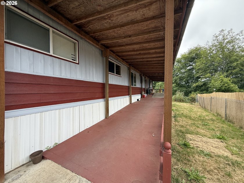 This spacious 1,800+ square foot manufactured home offers an - photo 3