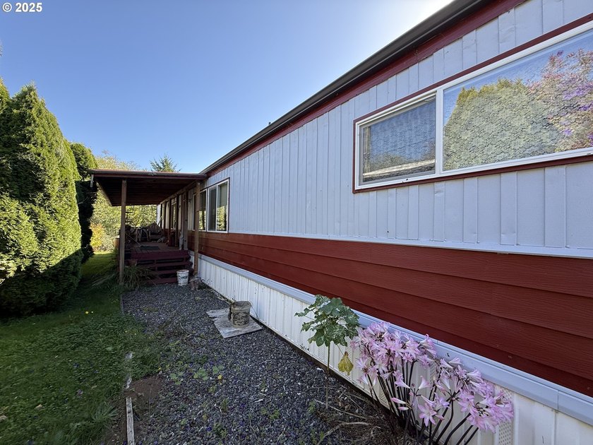 This spacious 1,800+ square foot manufactured home offers an - photo 4