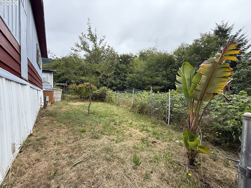 This spacious 1,800+ square foot manufactured home offers an - photo 5