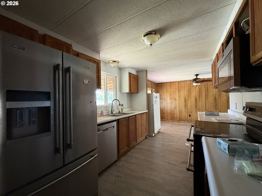 This spacious 1,800+ square foot manufactured home offers an - photo 8