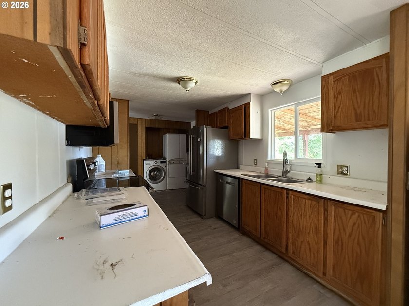 This spacious 1,800+ square foot manufactured home offers an - photo 9