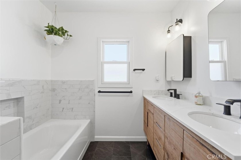 Welcome to this beautiful traditional home, where classic 1940s - photo 16