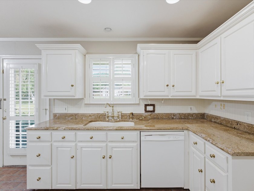 Nestled on over a third of an acre in a quiet cul-de-sac, this - photo 12