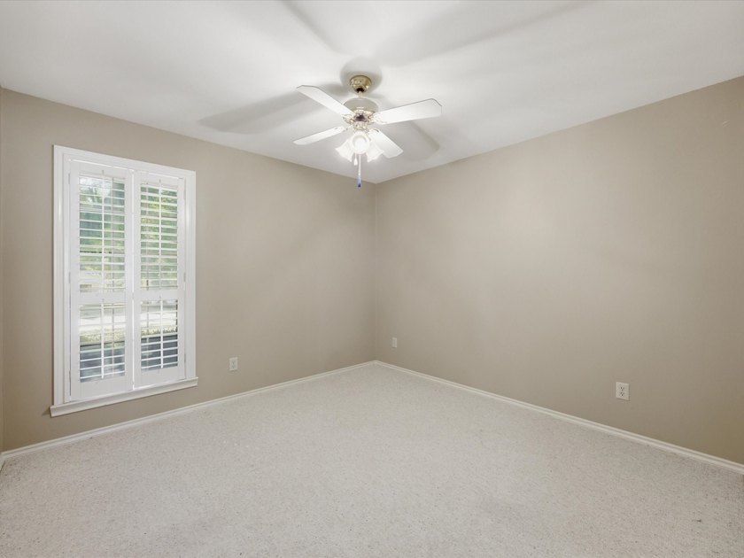 Nestled on over a third of an acre in a quiet cul-de-sac, this - photo 13