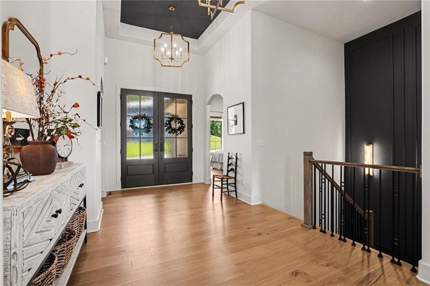 A stunning reverse ranch loaded with custom upgrades. Step - photo 5