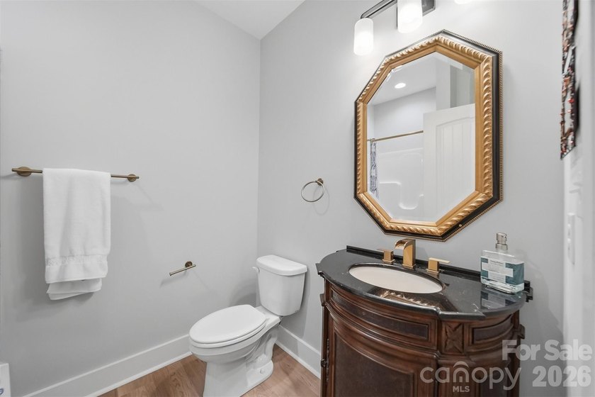 Custom home in a gated community, offering access to lake - photo 31