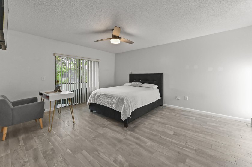 Welcome to 84 Conaskonk Circle in Royal Palm Beach, a bright and - photo 13