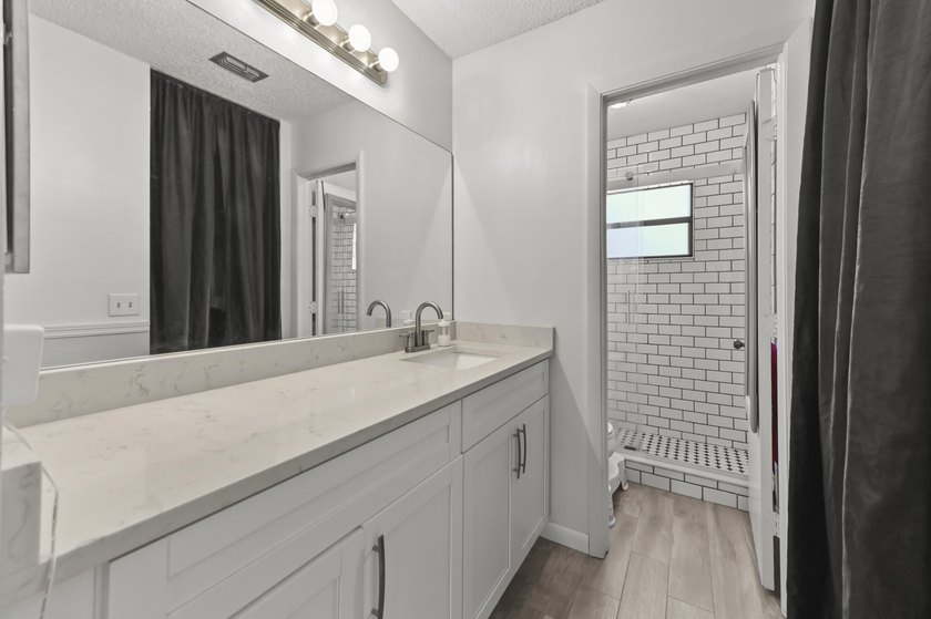 Welcome to 84 Conaskonk Circle in Royal Palm Beach, a bright and - photo 15