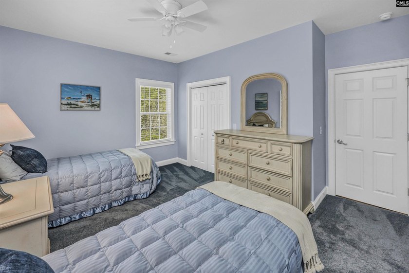 Modern comfort meets relaxed lake living on this spacious 1-acre - photo 10