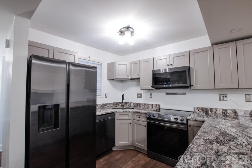 Renovated 2 bedroom, 2 bath townhome offering 1,200 square feet - photo 14