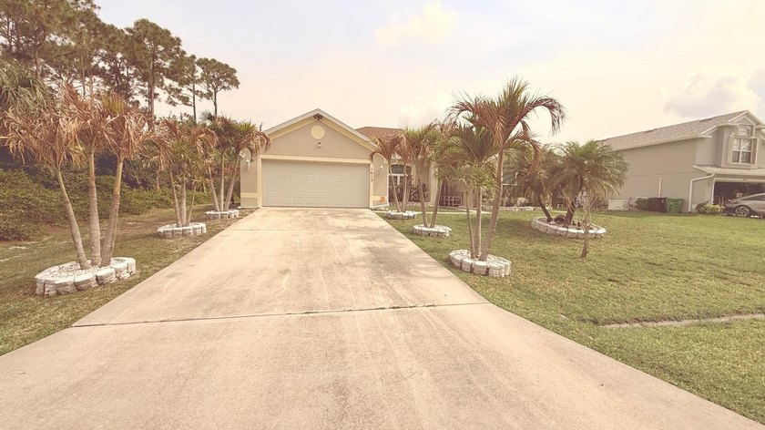 Welcome to this beautifully maintained Port St. Lucie home - photo 3