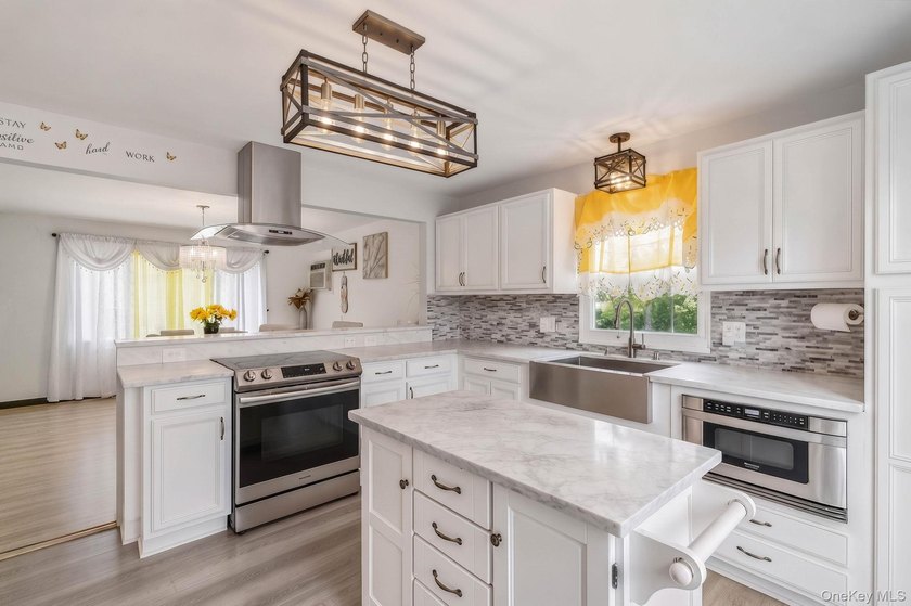 Welcome to this beautifully maintained Expanded Cape nestled in - photo 9