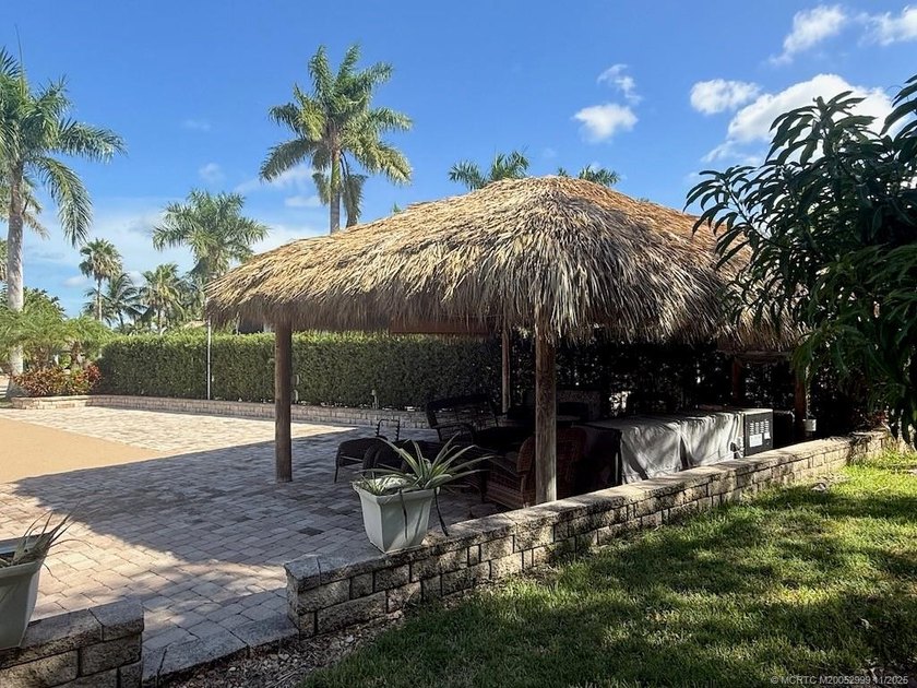 NEW TIKI RE-THATCH JULY 2025! This extra-wide lot, positioned - photo 16