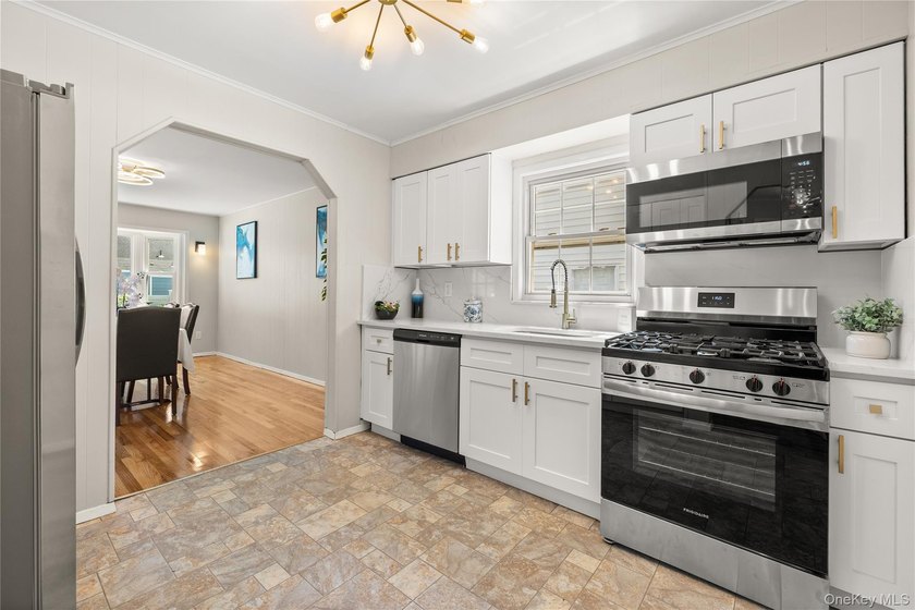 Welcome to This Beautifully Renovated 4-Bedroom, 2 Bath Expanded - photo 5