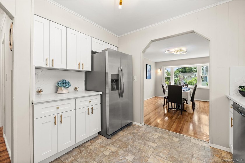 Welcome to This Beautifully Renovated 4-Bedroom, 2 Bath Expanded - photo 6