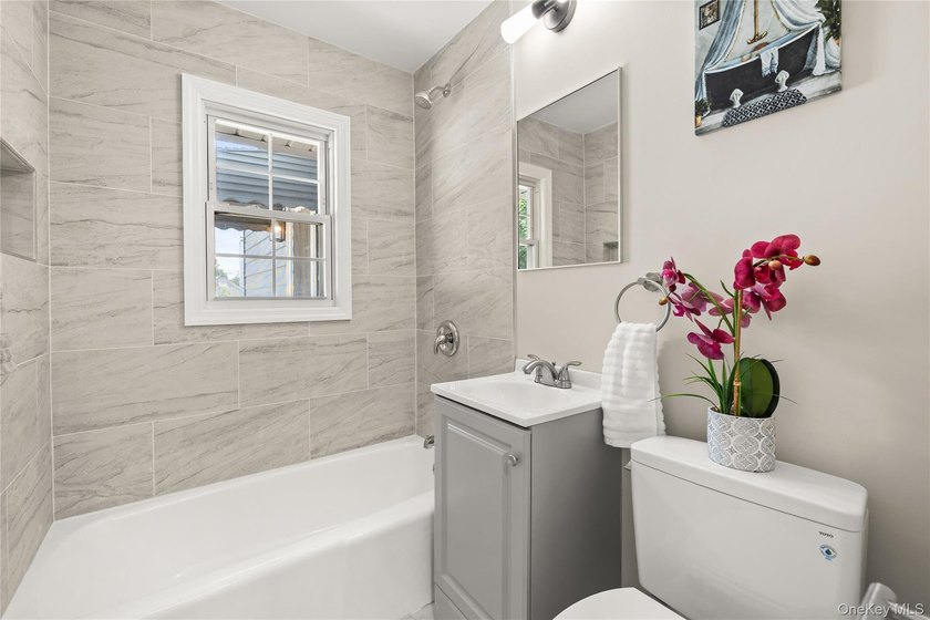 Welcome to This Beautifully Renovated 4-Bedroom, 2 Bath Expanded - photo 9