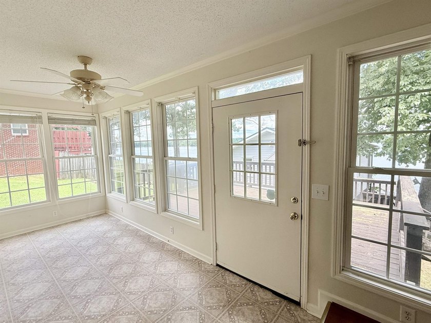 This waterfront home sits on Pickwick Lake. With 119 ft of - photo 8