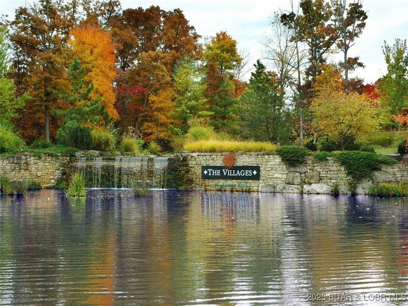 Surrounded by mature trees and natural Ozarks beauty, this - photo 15