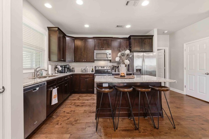 Welcome to this beautifully maintained 3 BR, 2.5-bath home in - photo 8