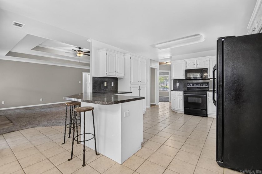 Welcome home to this beautifully designed 3-bedroom, 2-bath - photo 8