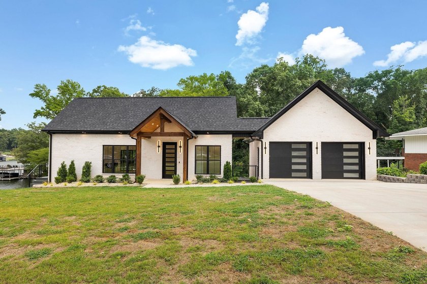 This new construction modern lake home is so fresh the walls - photo 2