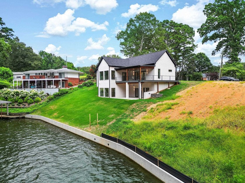 This new construction modern lake home is so fresh the walls - photo 3