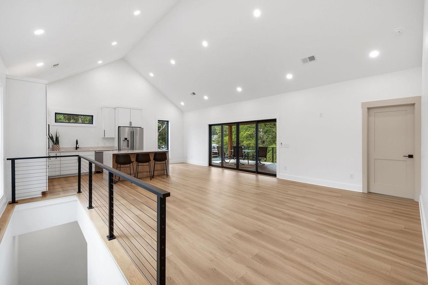 This new construction modern lake home is so fresh the walls - photo 4