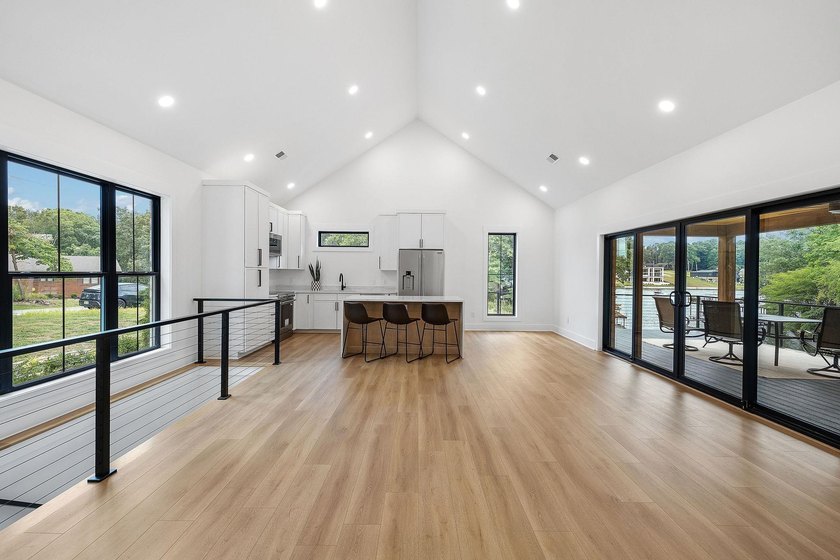 This new construction modern lake home is so fresh the walls - photo 5