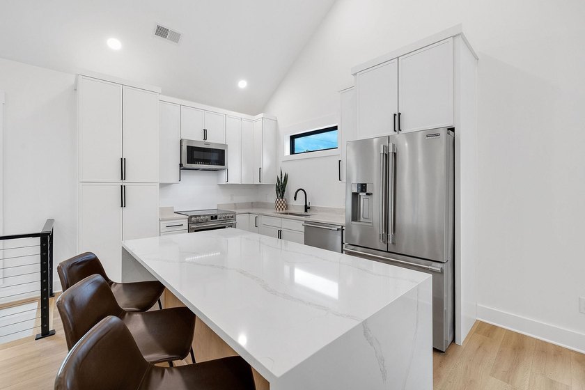 This new construction modern lake home is so fresh the walls - photo 6