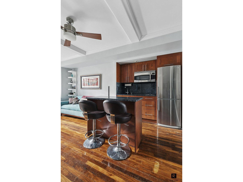 This thoughtfully renovated one-bedroom home captures the best - photo 3