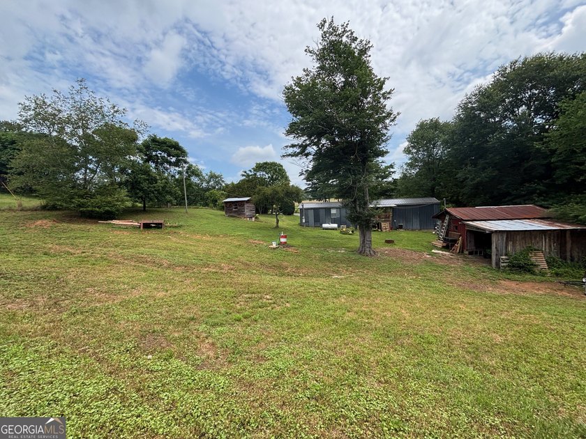 Looking for a private 2-bedroom home on acreage with no HOA? - photo 32