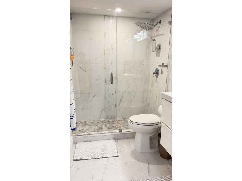 Bright and inviting 1-bedroom, 1.5-bath condo located less than - photo 8