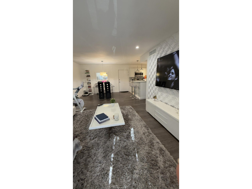 Bright and inviting 1-bedroom, 1.5-bath condo located less than - photo 9