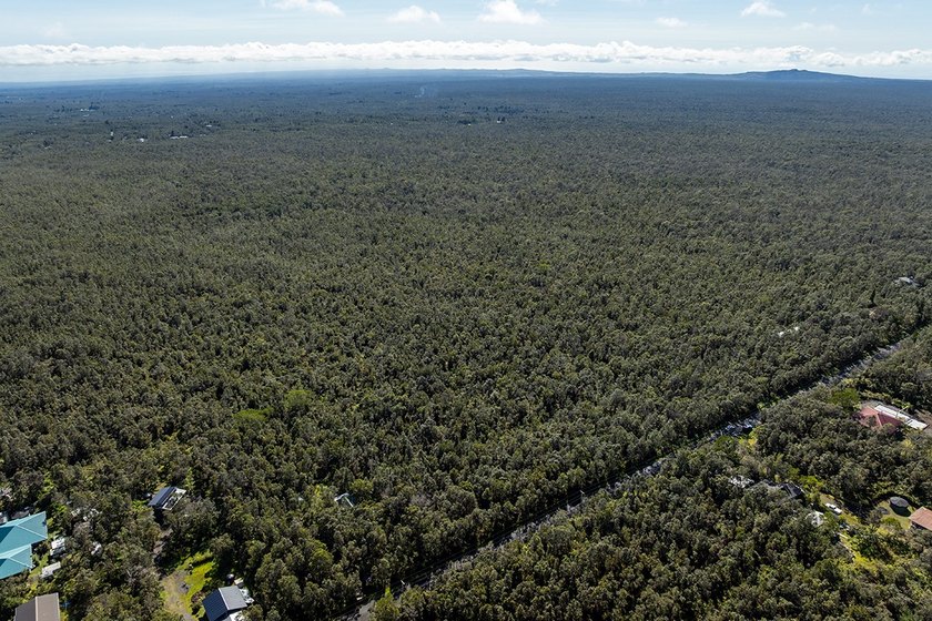 Nestled in the serene Ohia Estates subdivision near Volcano - photo 3