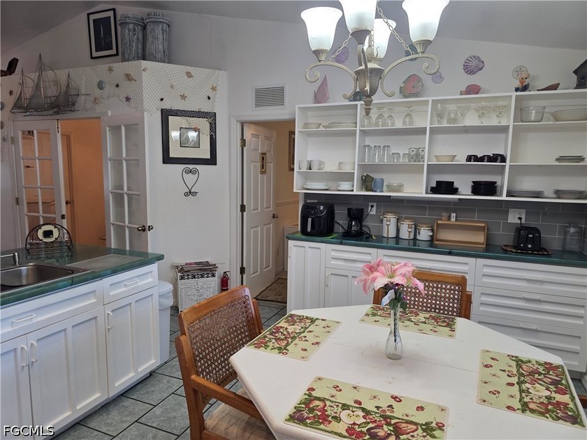 This charming home invites you to enjoy the good life with some - photo 8