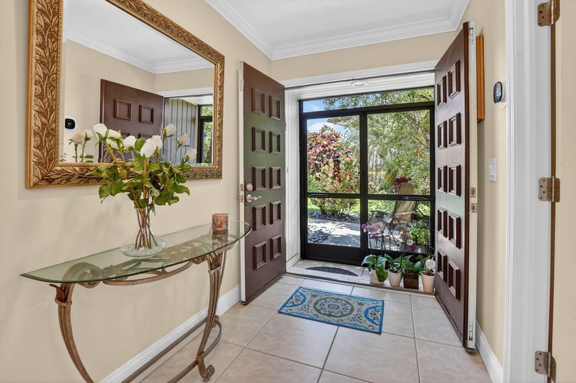 Welcome to 8208 Casa Del Lago, Unit 23B, an exceptional - photo 2